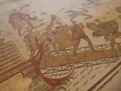 Piazza Armerina (villa Romana del Casale), ambulatory of the great hunt, sailing and hunting scenes Stock Footage