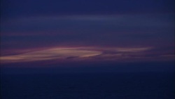 Sunset paints the sky in pastel colors against deep purple. Stock Footage