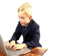 Boy at computer Stock Footage