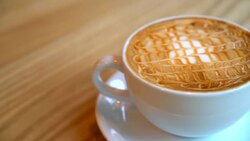 hot caramel macchiato in cafe Stock Footage