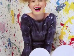 Young woman letting go of helium balloons Stock Footage