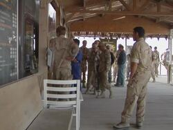 WS Group of soldiers waiting for refreshment / Kandahar, Afghanistan. Stock Footage