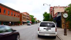 Sapulpa Oklahoma Route 66 town main street called Dewey Street with Route 66 signage get your kicks on Route 66 Stock Footage