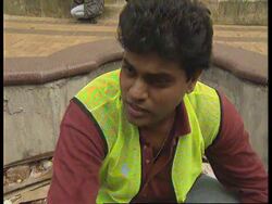 SINGAPORE: LITTERBUG FORCED TO WORK AS GARBAGE COLLECTOR News Clip