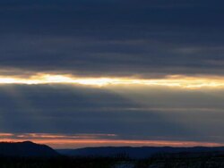 T/L Sun ray beams, passing through clouds. Progressive frames Stock Footage