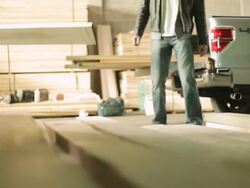 MS Two young men working together in lumberyard / Minneapolis, Minnesota, United States Stock Footage