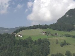 WS POV ZO View cottage house over mountain / Ober Nas, Nidwalden, Uri, Switzerland Stock Footage