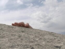 Business man climbs mountain Stock Footage