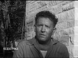 1952: ORGANIZED LABOR: EXT VS Steam worker John Cody working steam machine outside entrance to Baker Smith Co. contractors store, John speaking about unions, Democrats vs. Republicans, voting. Laborer, NYC Instructional Video