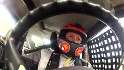 Stock-car driver shifts gears, checks rearview mirror (Steering-Wheel POV) Stock Footage