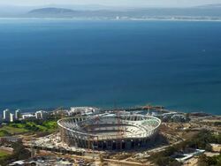 T/L The new FIFA 2010 Cape Town Stadium under construction in Greenpoint, seen from Signal Hill, South Africa Stock Footage
