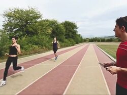 Personal trainer training two athlet girls Stock Footage