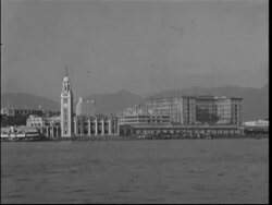 HONG KONG, 1950, Funicular, boats in harbour, chinese junks, East Asiatic Company Ltd Stock Footage