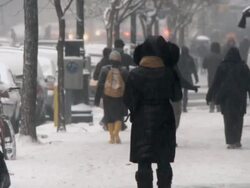 WS People walking on sidewalk during snow / New York City, New York, USA  Stock Footage