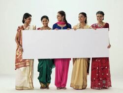 Portrait of group of women showing a placard  Stock Footage