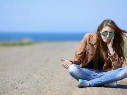 girl hitchhiking Stock Footage
