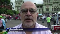 VOICED : Guatemaltecos exigen renuncia de Otto Perez News Clip
