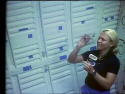 Astronaut Rhea Seddon playing jacks in Space Shuttle Stock Footage