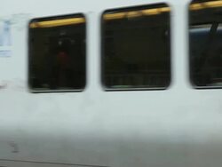 MS Metro train arriving and commuters at Flinders Street Station / Melbourne, Victoria, Australia Stock Footage