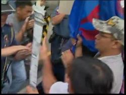 Militant women's group storms US embassy over alleged rape by US serviceman News Clip