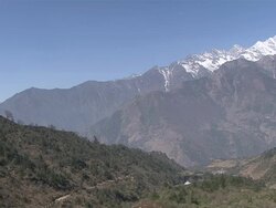  WS PAN View of Khumbu Valley with snow covered Mountains / Lukla, Khumbu Region, Nepal Stock Footage
