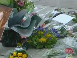 WRAP Flower laying at King's Cross; aerials, commuters News Clip