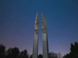MS ZI LA T/L Shot of Beautiful Night skyscape of Baengma goji ( Battle of White Horse Hill ) Monument at Cheorwon / Cheorwon, Gangwondo, South Korea Stock Footage