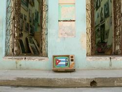 MS Shot of Cuban flag on TV / Cuba  Stock Footage
