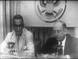 1952: DEMOCRATIC PRESIDENTIAL PRIMARY DEBATE: Senators Estes Kefauver & Richard B. Russell sitting side by side, SOT Kefauver talking about people trying to stop him in Florida, politicians, criminals, Russell responding. MS Two unidentified men. Instructional Video