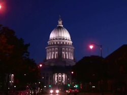 MS View of lit capitol building at night with traffic in street / Madison, Wisconsin, United States Stock Footage