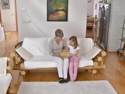 HD DOLLY: Granny Reading Book With Granddaughter Stock Footage