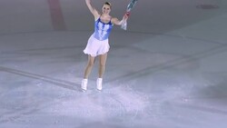 SLO MO Skater waving with roses in her hand Stock Footage
