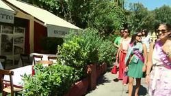 Tourists enjoy ancient monuments and culinary delights News Clip