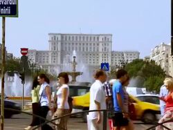 MS Pedestrians crossing union square near house of people / Bucharest, Romania Stock Footage