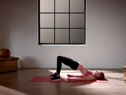Woman doing her workout in gym (pelvis lift) Stock Footage