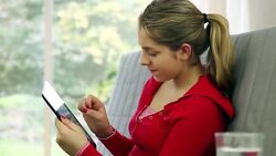 Girl using digital tablet. Stock Footage