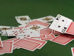 HD Super Slow-Mo: Poker Cards Falling On Table Stock Footage
