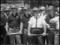 B/W 1963 Alabama National Guard standing with nightsticks during desegregation of U. of Alabama Stock Footage
