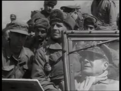 B/W 1950's Douglas MacArthur and soldiers in off-road vehicle / Korea / NO SOUND Stock Footage