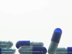 Falling Capsules Stock Footage