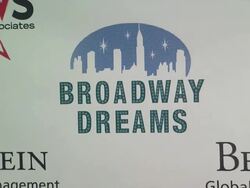 ATMOSPHERE: signage at The Broadway Dreams Foundation "Champagne And Caroling" Gala - Arrivals Stock Footage