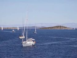 A sailnig boats near the Zut island, Kornati National Park Stock Footage
