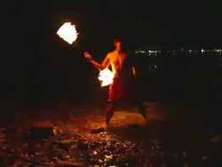 HD:Young man perform fire show on the beach.. Stock Footage