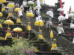 MS Balinese people visiting colorful decorated Mother temple of Besakih for ceremony / Besakih, Bali, Indonesia Stock Footage
