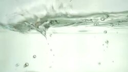 Tomato drop in the water. Close up. Slow motion. Stock Footage