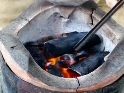 charcoal in stove Stock Footage