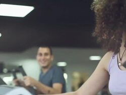 Girl on a cardio machine Stock Footage
