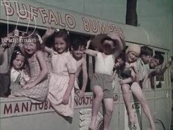 Green Islands, 1954, part 3 - kids in playground, walking race, go-karting, fairground rides Stock Footage