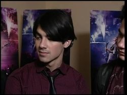 Band surprise fans at first showing of 3D movie News Clip