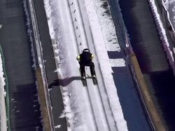 HD Super Slow-Mo: Professional Athlete Performing Ski Jump Stock Footage